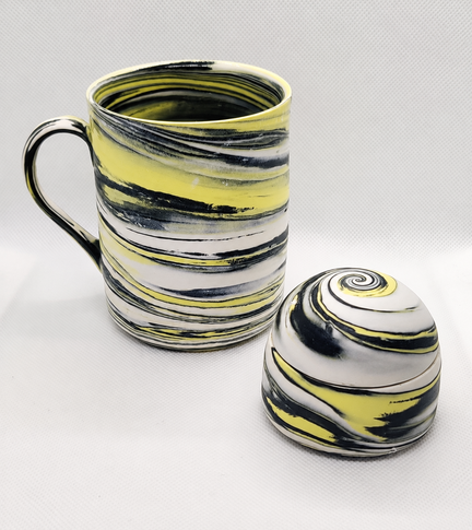 black and yellow mug set in parian clay