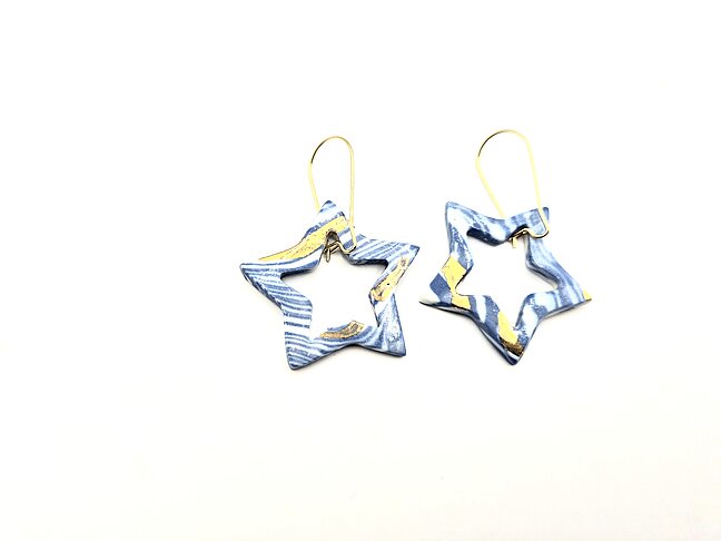Lovely star shaped earrings made in blue and white porcelain made by Sandgate Ceramic. 