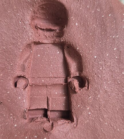 lego man in clay from Cabinet of (un)Natural History by Rosalie Morris